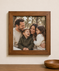 Custom wooden picture frame in golden oak displaying family portrait — handmade in Canada ships Canada and USA